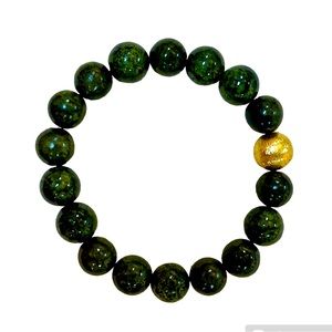 AFRICAN
TUROUOISE
WITH HAMMERED
GOLD ACCENT